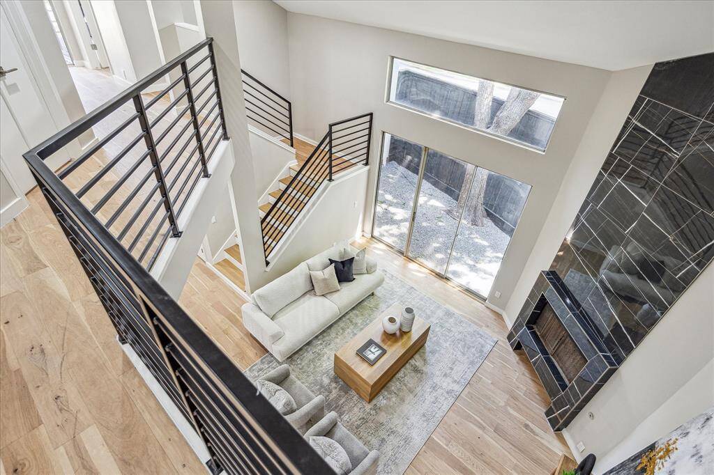 Versatile and full of potential, this bonus area is ideal for a cozy sitting area, reading nook, computer station, or home office. Bathed in natural light with an open view of the living room and patio below, it’s both functional and inspiring.