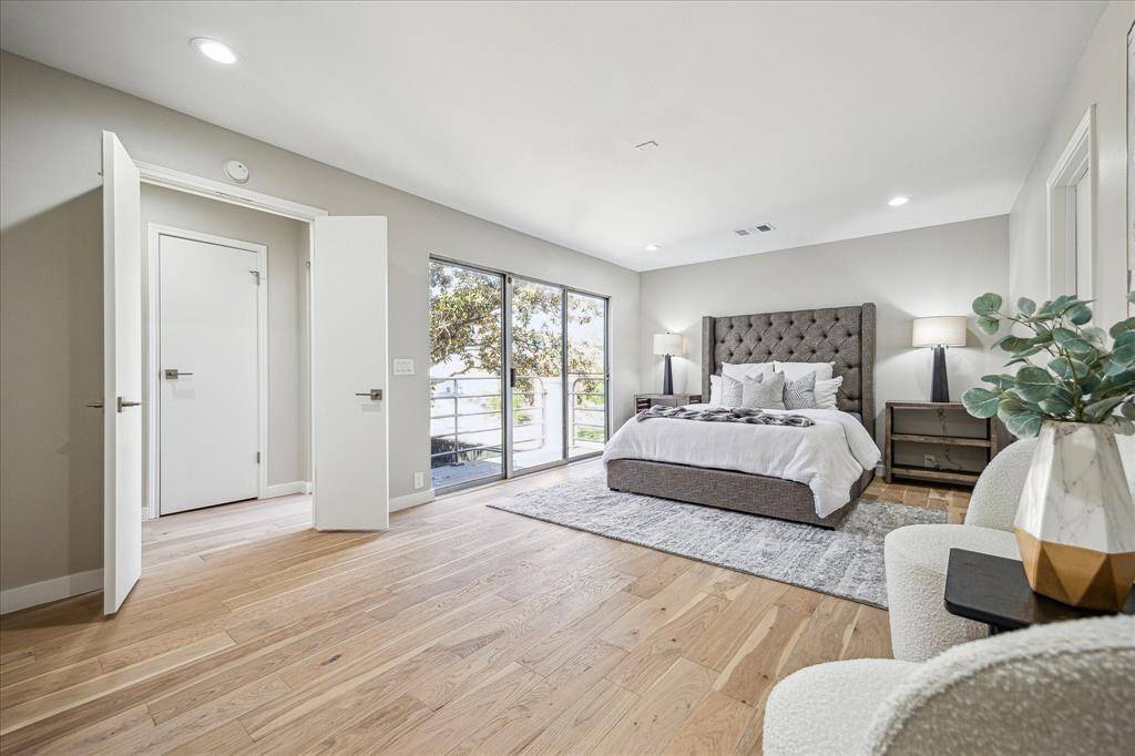 This two-story living room is just as impressive from the second-floor landing.