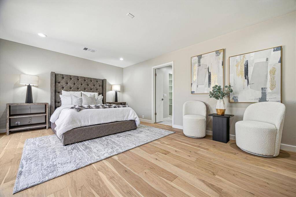 You’ll have sweet dreams in this posh owner’s retreat featuring White Oak engineered hardwood flooring, fresh neutral paint, a private balcony, walk-in closet, and a stunning spa-like ensuite bathroom.