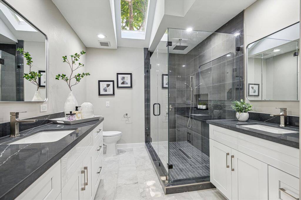 Before turning in for the night, step out onto the private balcony off the owner’s retreat and take in the peaceful views of the tree-lined street below, a peaceful pause before settling in for the night.