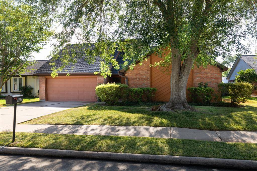 The front yard is shaded and attractive!