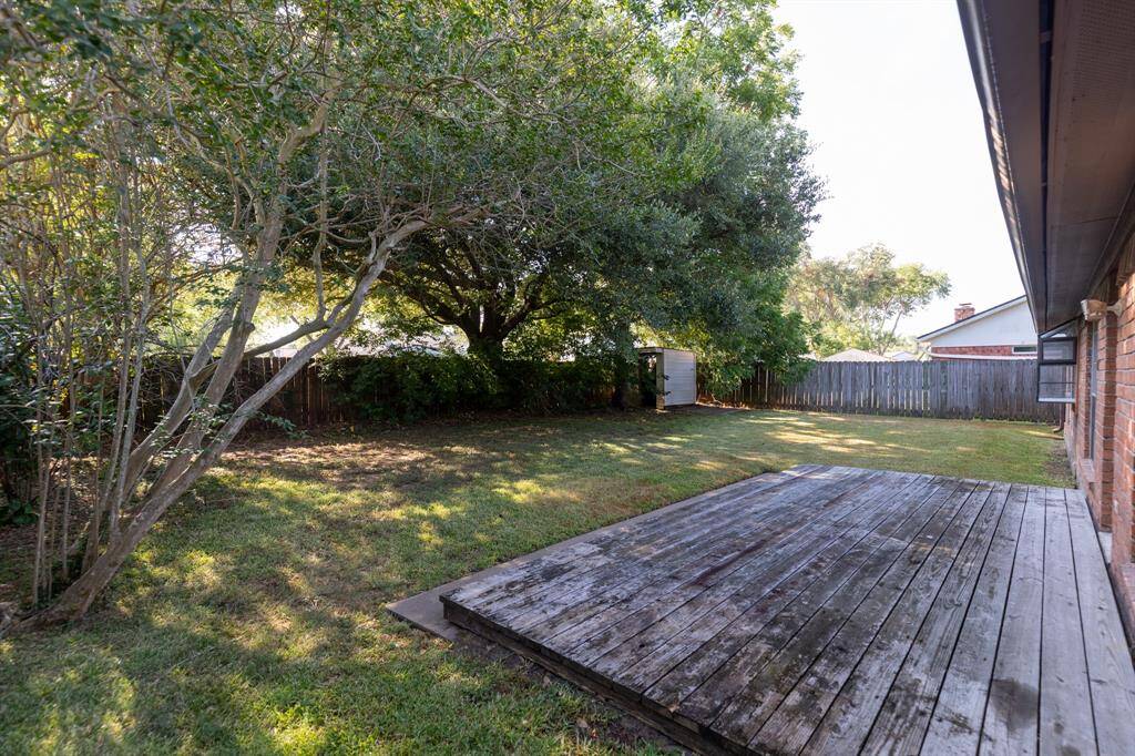 The back deck is roomy and the yard is shaded