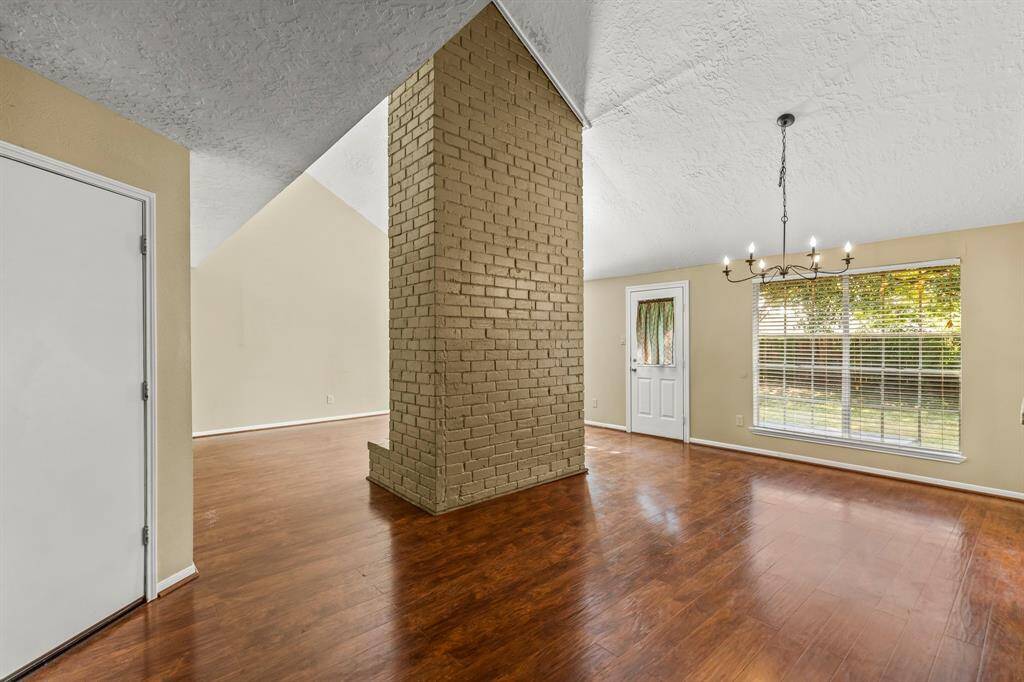 The view toward the back yard and dining area with the beautiful updated chandelier