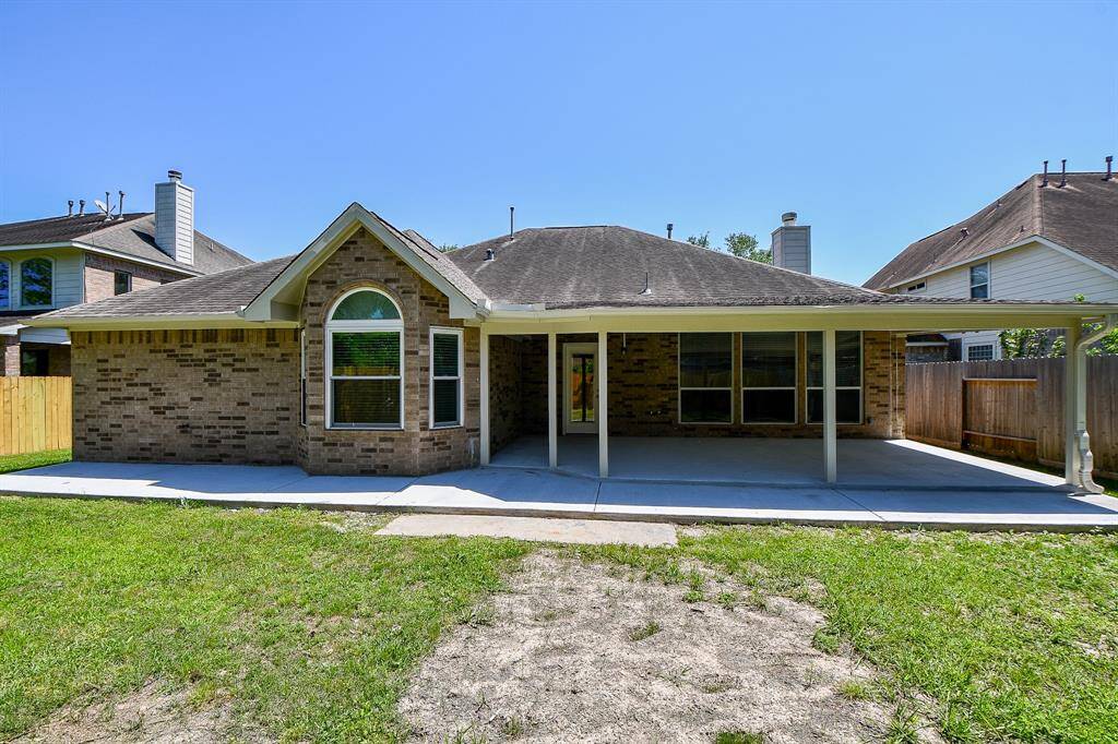 Another view of the extended concrete slab allows plenty of space for your BBQ grill
