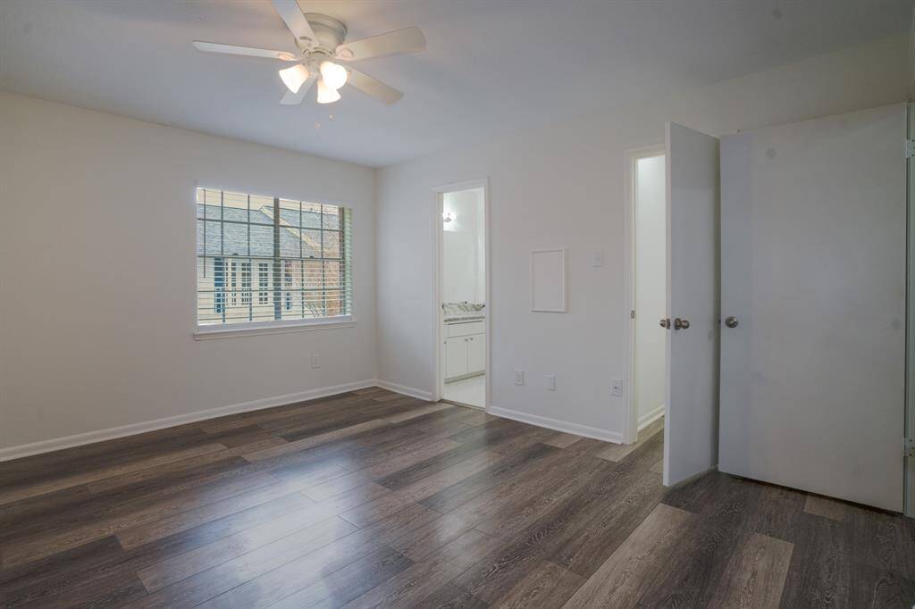Primary bedroom with lots of closets.