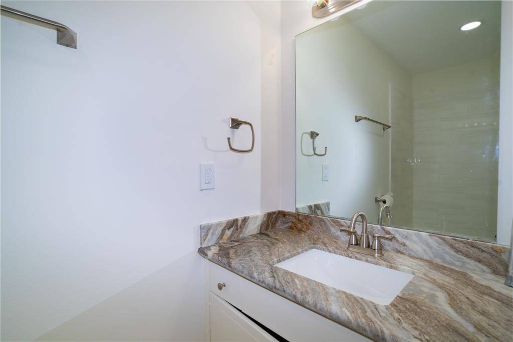 Second full bathroom with tub-shower on second floor