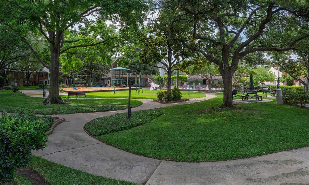 Recreation area includes children's play area and swimming pool with shallow splash area.