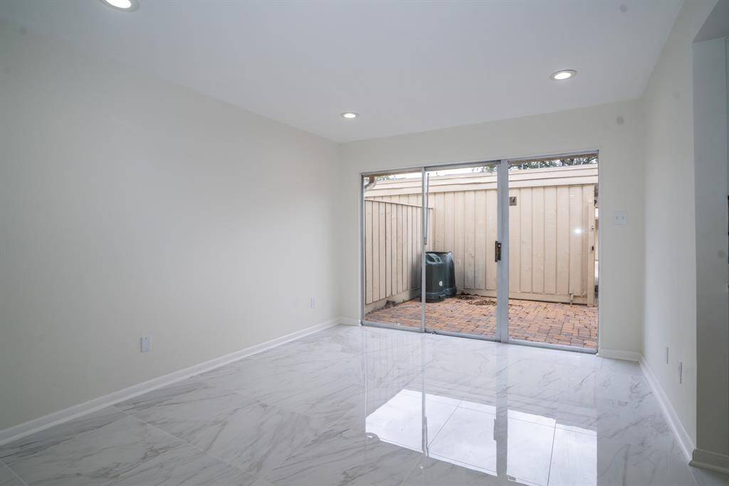 Dining room and or Family Room leading to outside and garage/carports