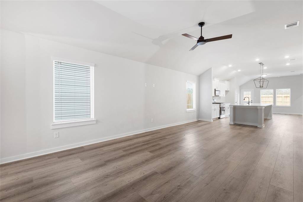 View from your massive living room open to your kitchen/dining area!