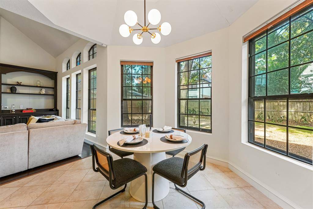 Surrounded by large picture windows, the sunny breakfast nook offers the perfect spot to start your day.