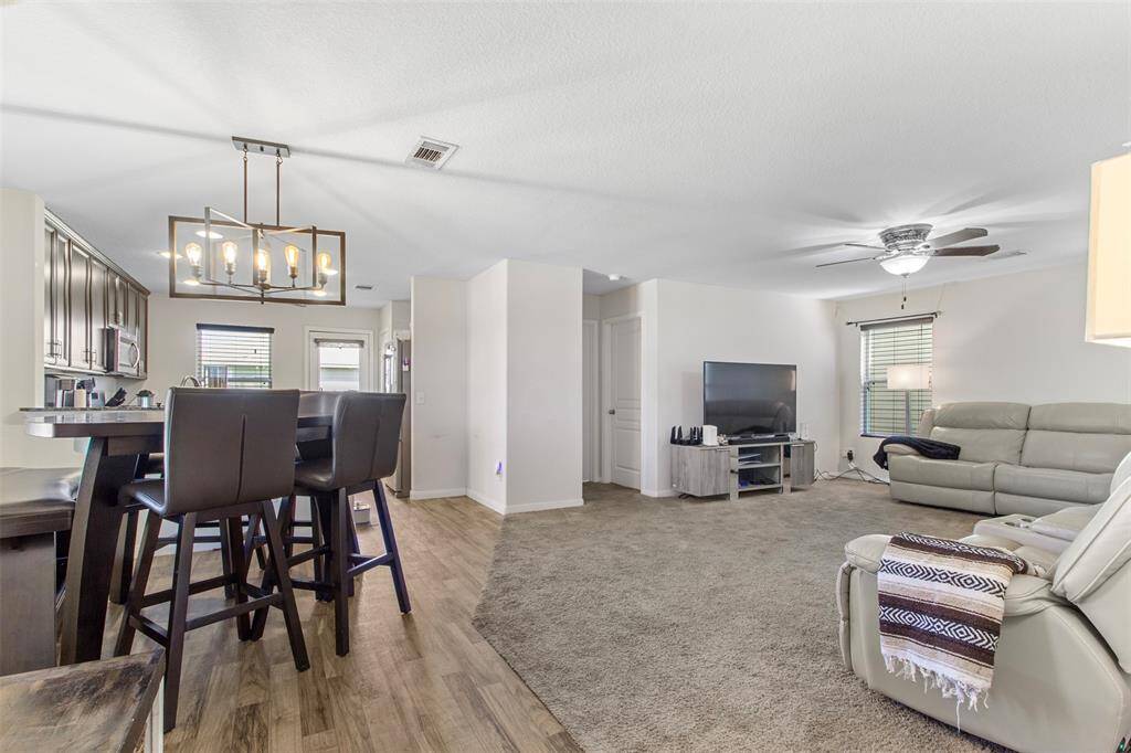 The open floor plan allows for a more spacious feel