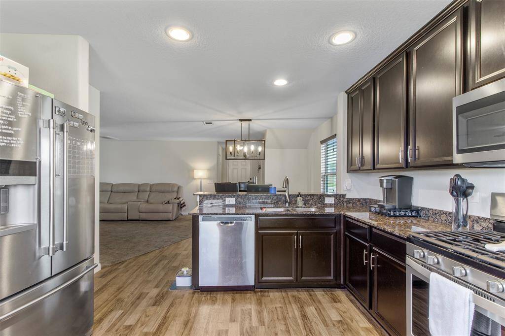 Stainless steel appliances that convey with the home