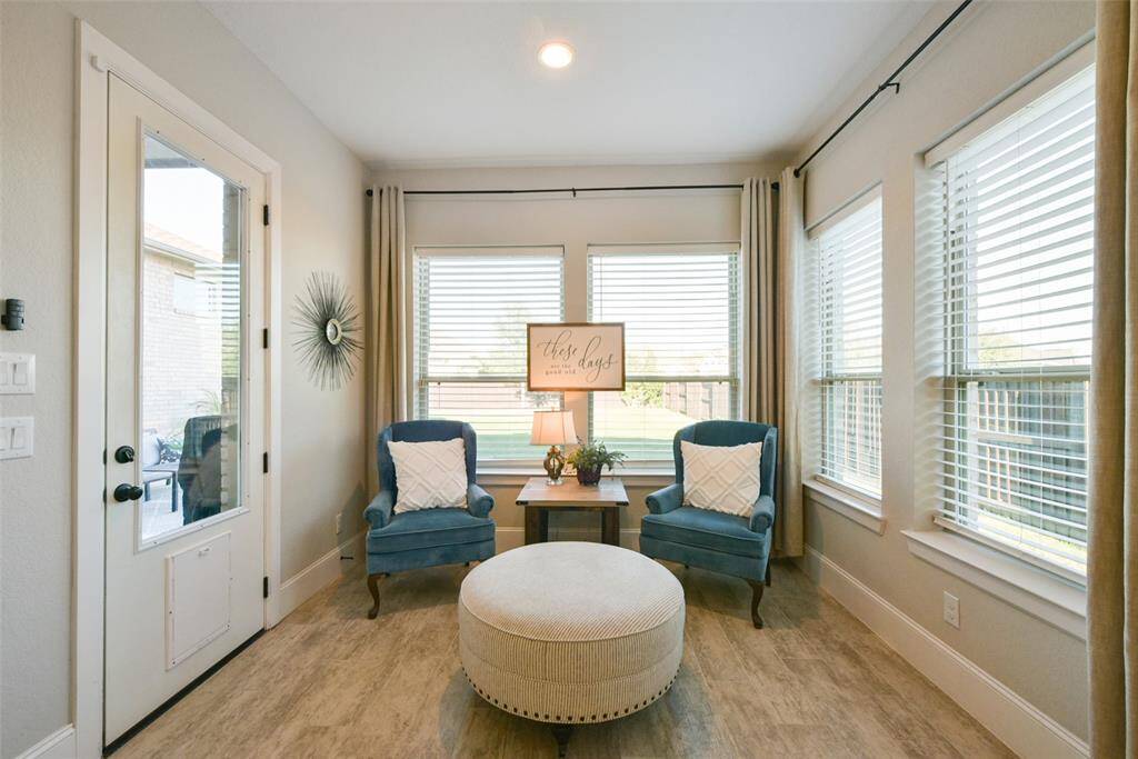 Sun room or flex space with views to the spacious yard.