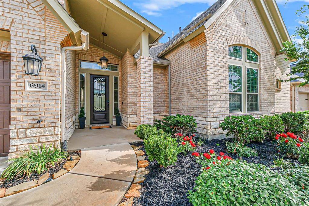 Classic appeal with brick and stone façade.