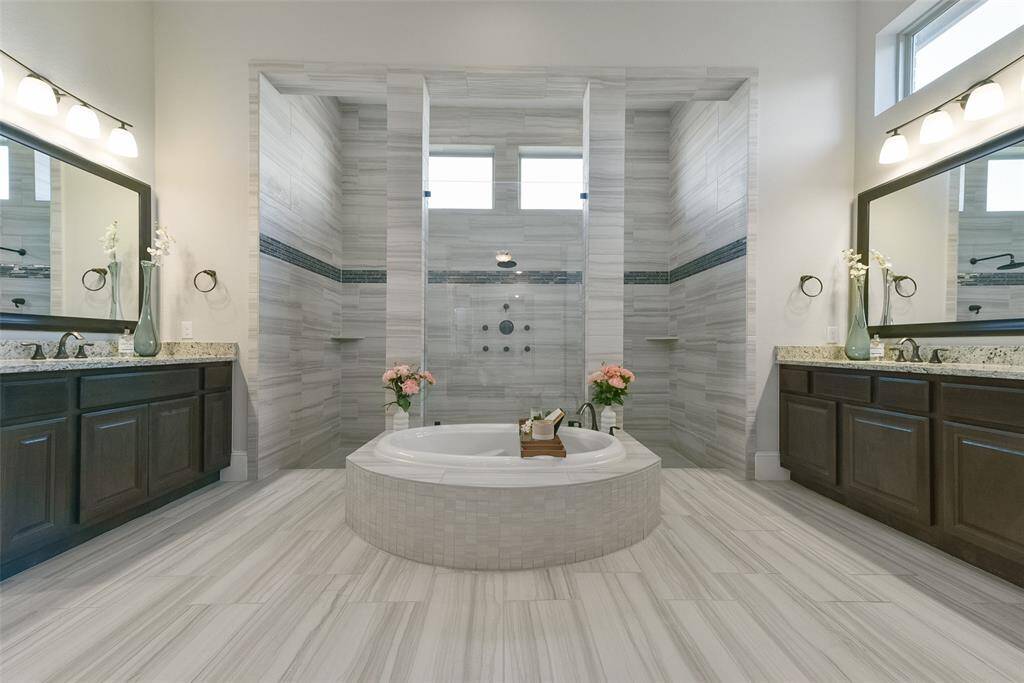 Home spa is beautiful and light filled with all the transom windows.