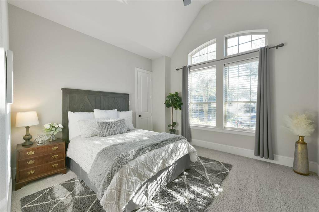 2nd bedroom has vaulted 13' ceilings and an on suite bathroom.