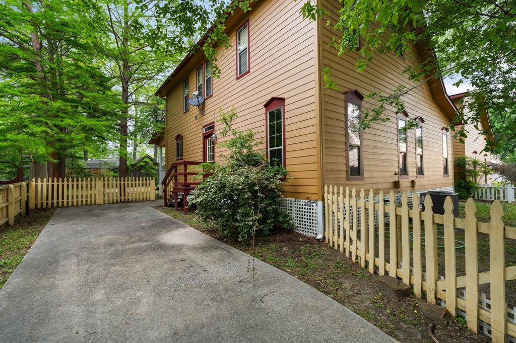 Additional Driveway behind house.