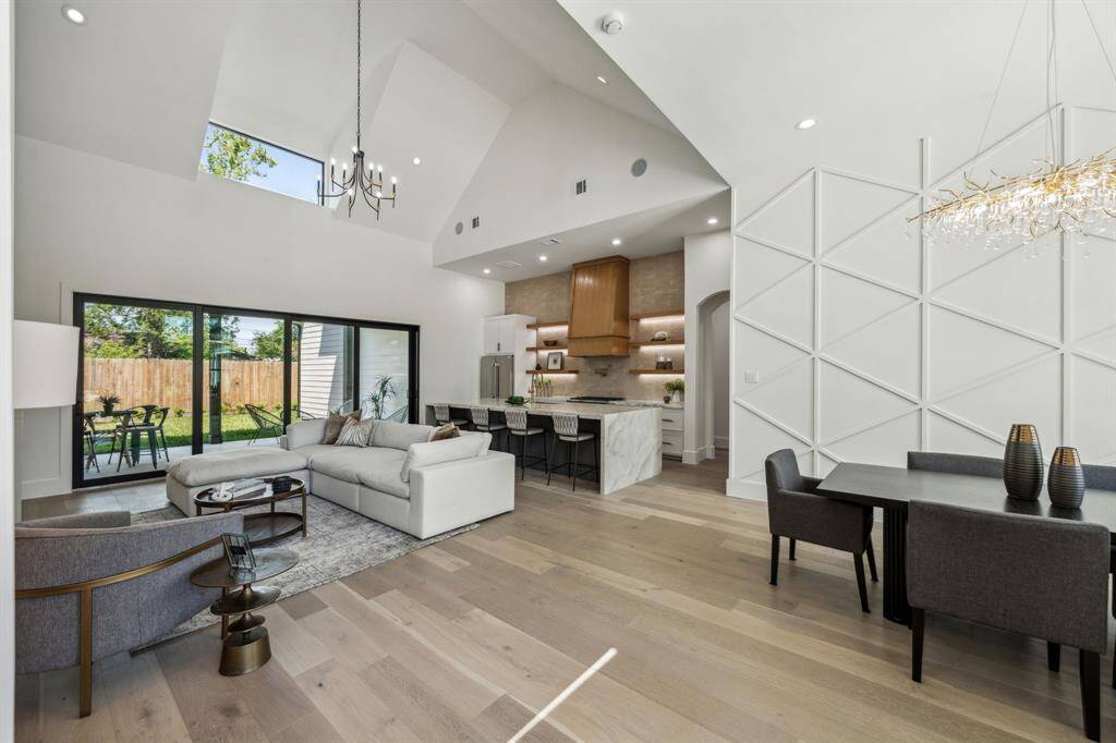 The ceilings soar and the windows light up the space!