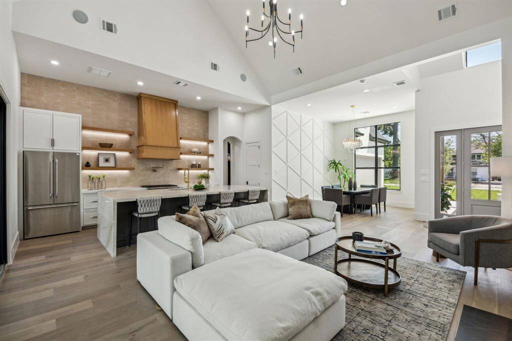 The open concept living blends the living, kitchen and dining areas seamlessly.