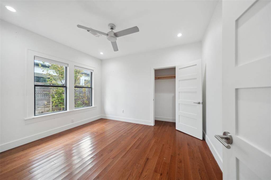 The last of the secondary bedrooms features a large closet, updated lighting and ceiling fan, hardwood floors and North/South exposure with plenty of light.