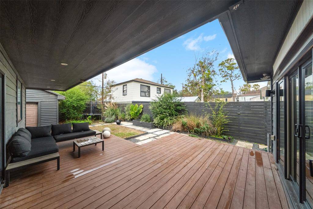 With access from the kitchen and the primary bedroom this oversized deck is an entertainers dream! As you can see, it is partially covered as well. (Patio furniture excluded)