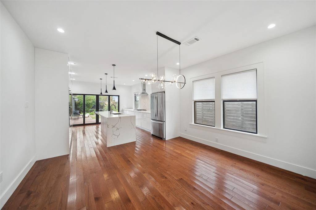 Open to the kitchen the dining room is the perfect place for entertaining friends and family.
