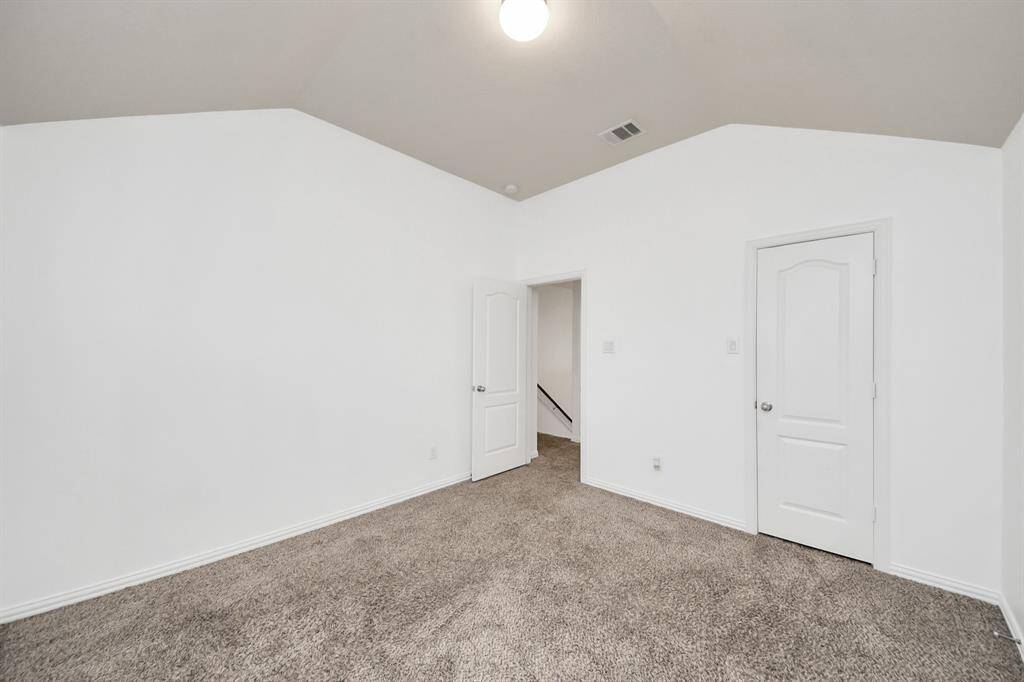 Rounding out the five bedrooms, the fifth offers the same spacious feel—perfect as a guest suite, office, or creative space.