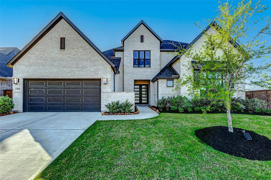 Welcome to this breathtaking David Weekley Layton plan, located in the prestigious Cane Island community. Nestled on a tranquil corner lot, this exceptional 4-bedroom home boasts 3 full and 2 half bathrooms, offering refined living with the utmost privacy—no rear or side neighbors and a serene greenspace backdrop.