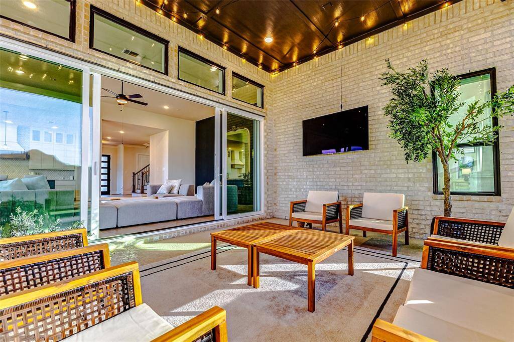 Through the sliding glass doors in the living room, you’ll find an expansive covered patio. Its seamless connection to the living areas makes it an ideal space for entertaining.