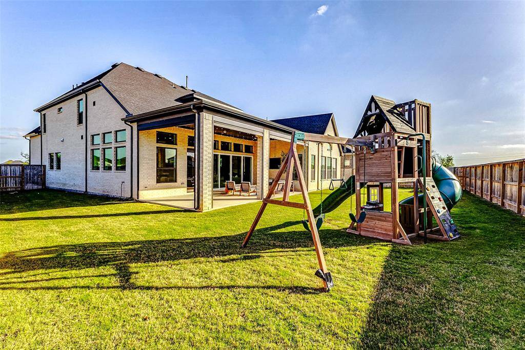 Even with the expansive patio, there’s still an abundance of green space, perfect for children to play, pets to roam, or whatever activities you desire.