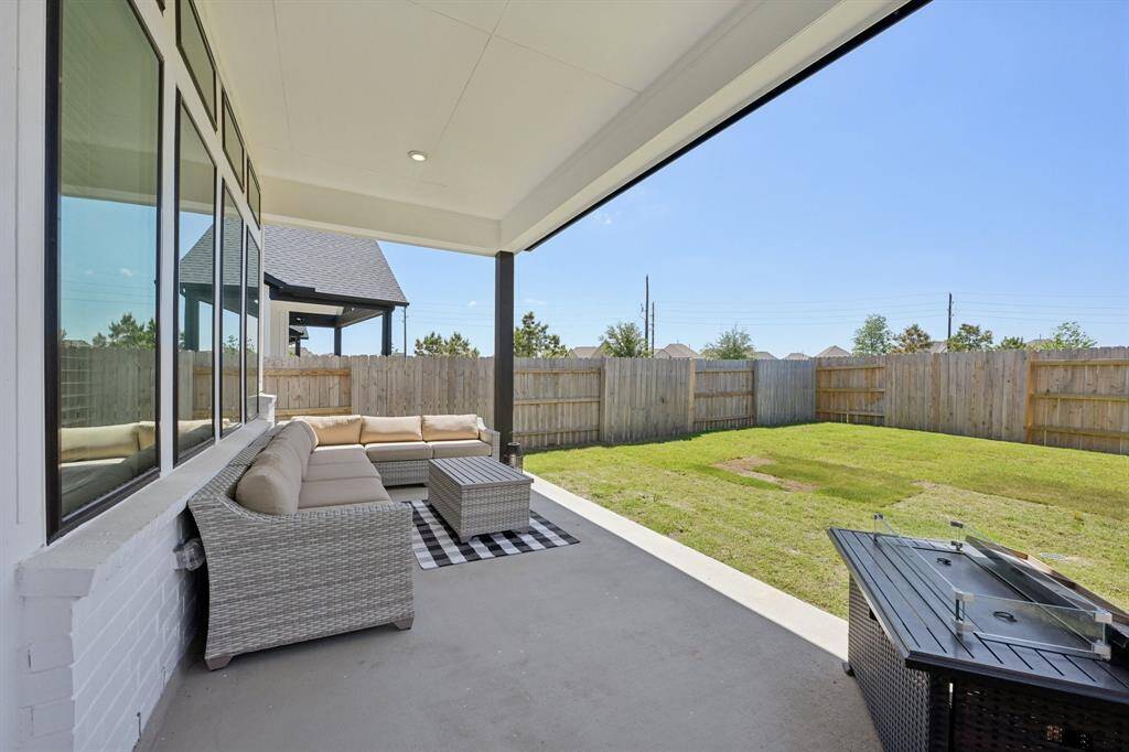 Nice backyard space with covered porch.
