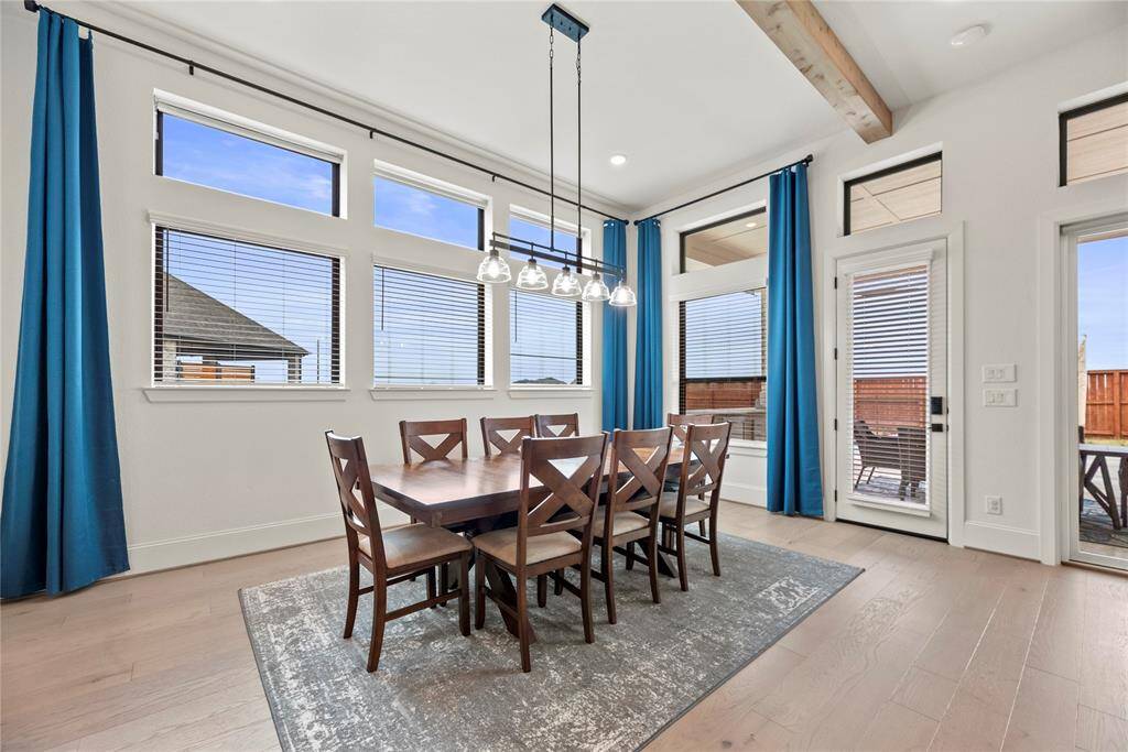 With the dining area nearby, it's easy for family members to enjoy casual meals together or for guests to chat with the cook while meals are being prepared. This spacious area is perfect for entertaining and will easily accommodate a large table.