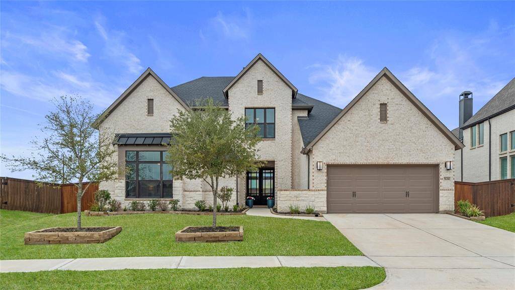 Welcome home to 7630 Redwoods Forest Drive, nestled in the prestigious Cane Island community in Katy!