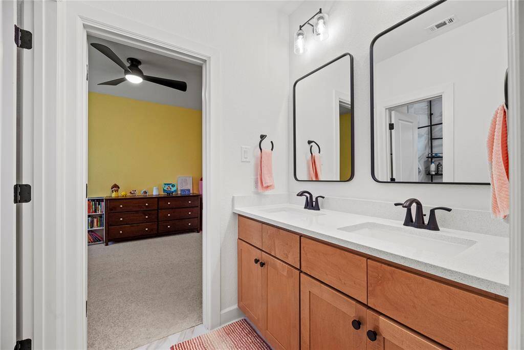The Hollywood bath features a spacious dual vanity, making busy mornings a breeze for the whole family.