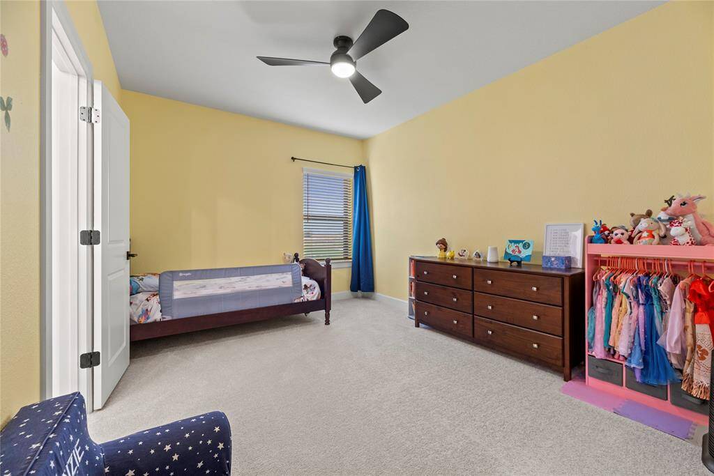 The thoughtfully designed layout of your fourth bedroom allows for natural light to flood the room, creating a warm and welcoming atmosphere.