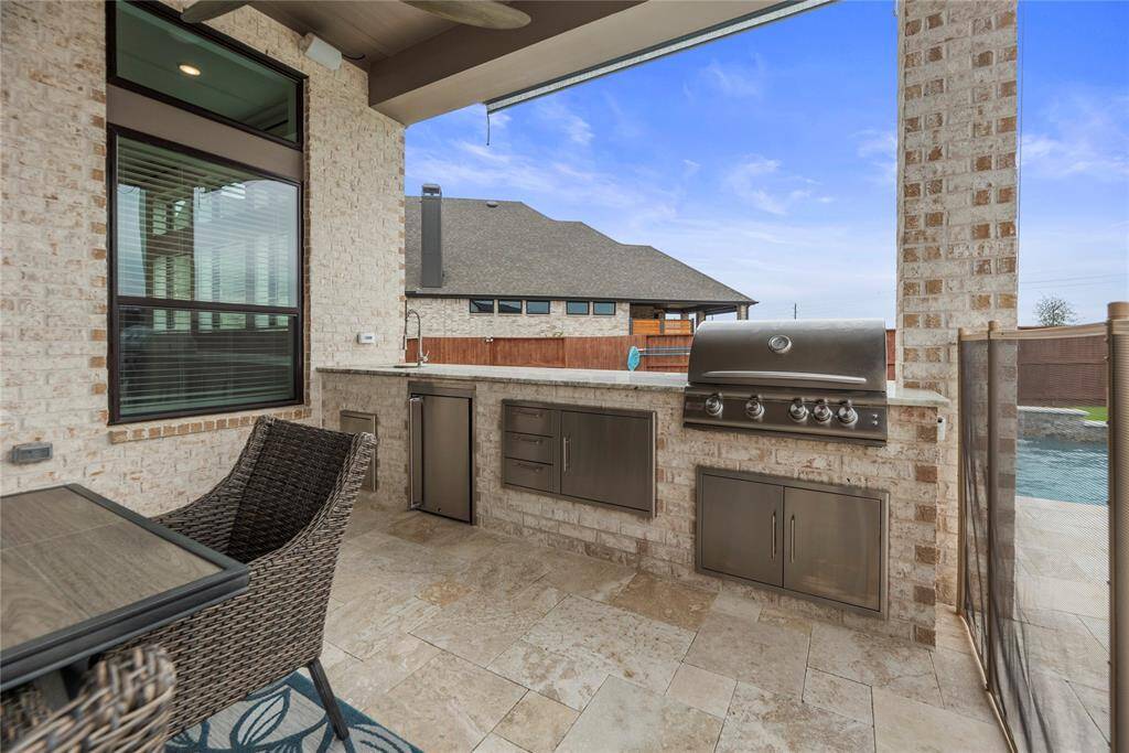 Light up the grill and invite friends over. Enjoy entertaining outdoors with the patio kitchen.