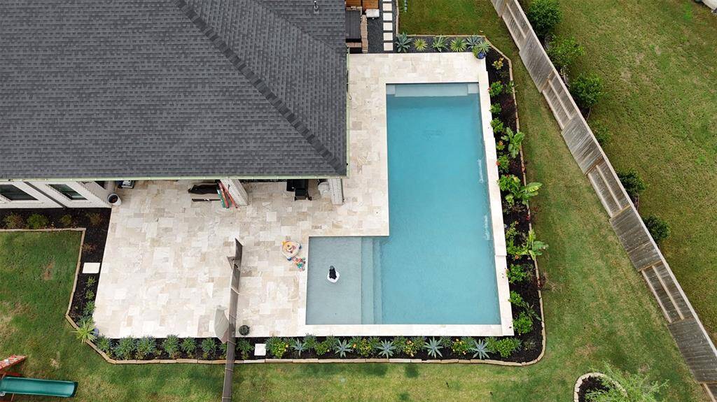 From an aerial perspective at the back of the home, you'll truly appreciate its beauty and elegance.