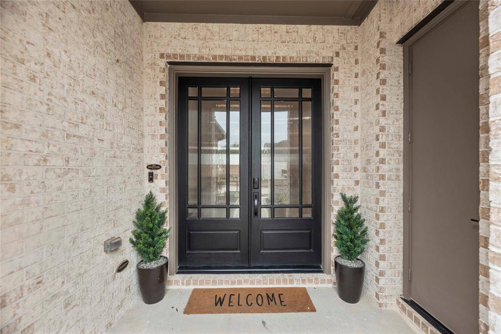 Step through the exquisite double leaded glass doors and enter a home where elegance and sophistication await.