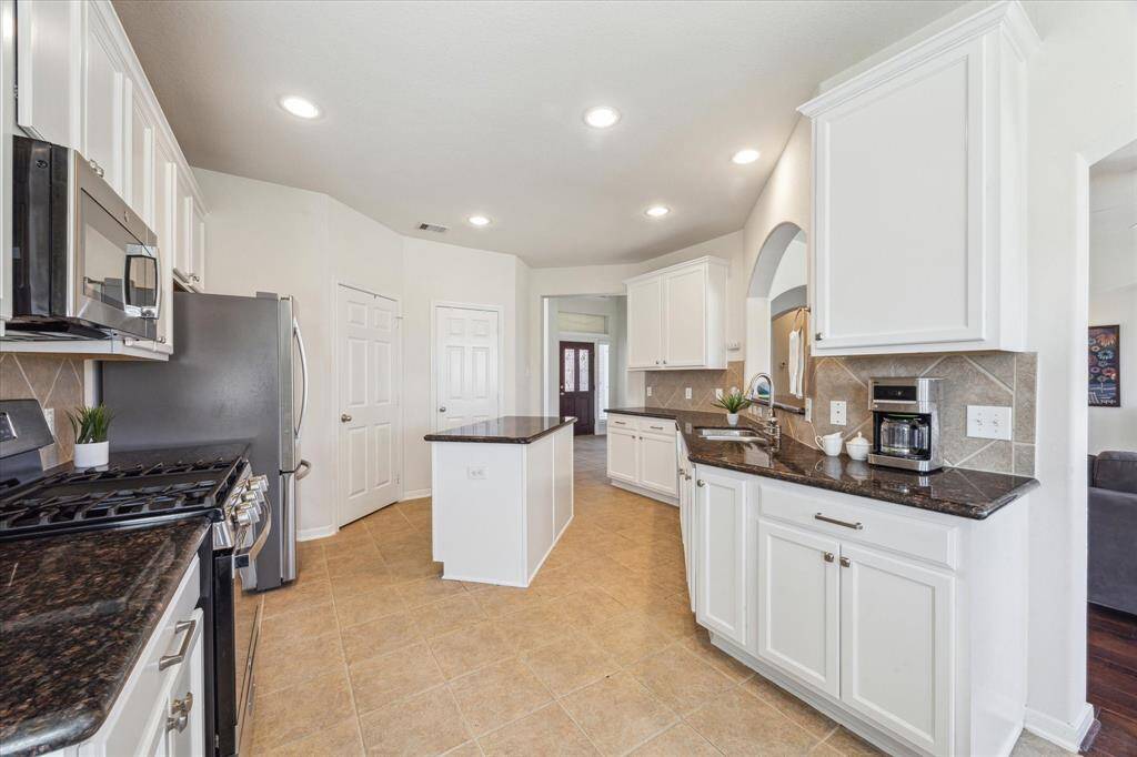 Another view of the kitchen looking towards the front door