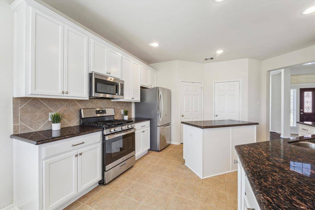 Another view of the kitchen