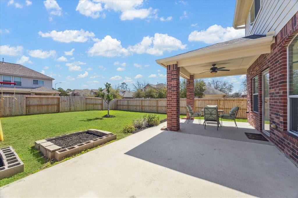 Nice outdoor partially covered patio area.