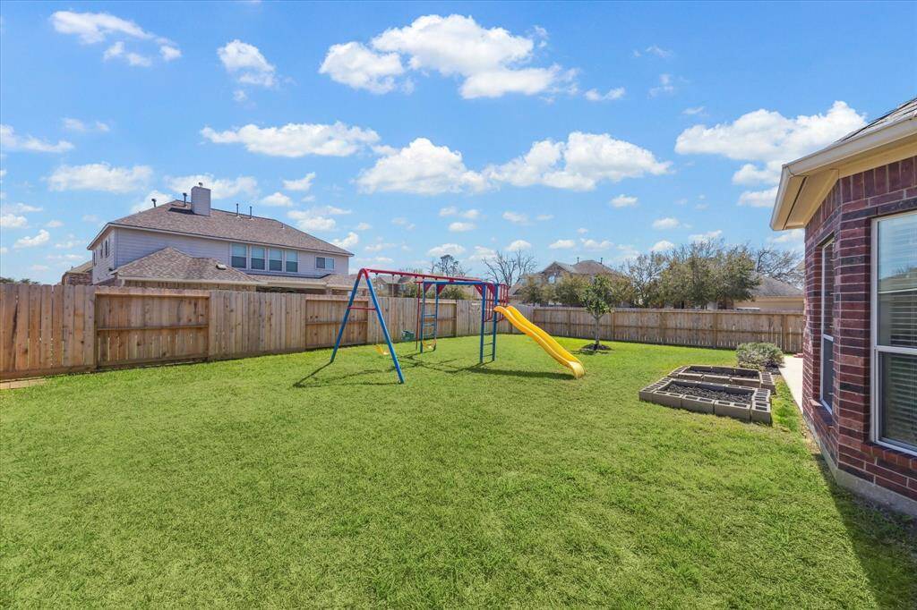 Big back yard.  Swing set stays!