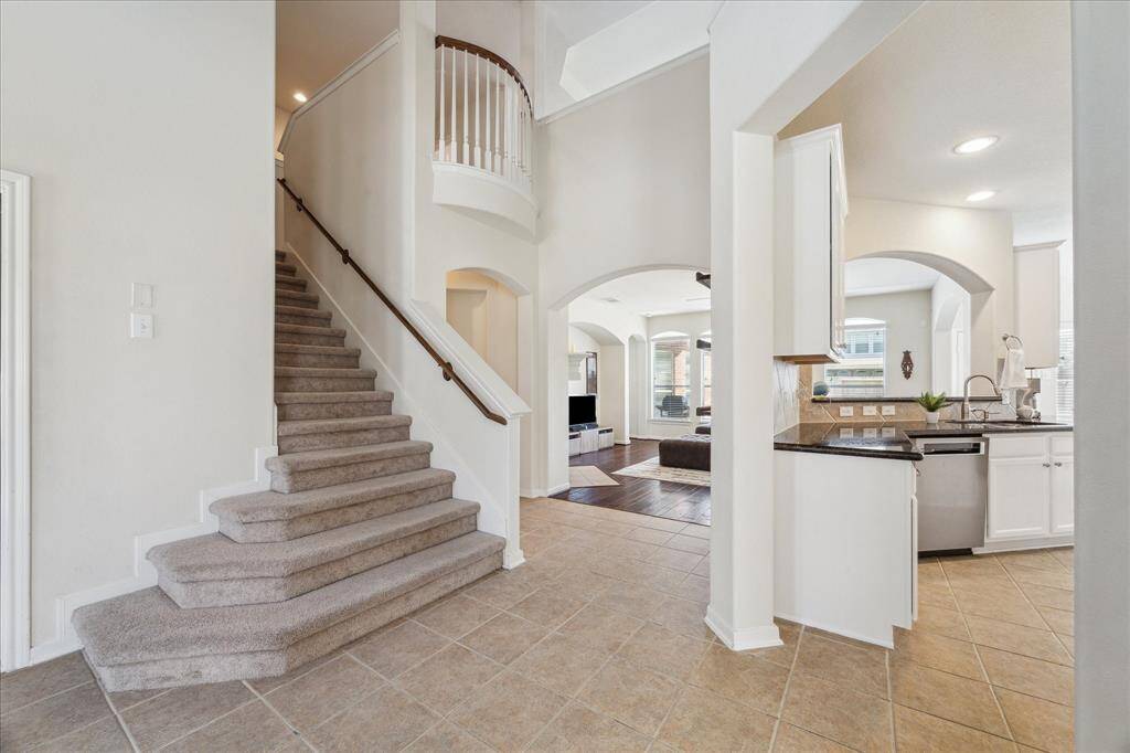 Another view from foyer area looking towards kitchen and family room