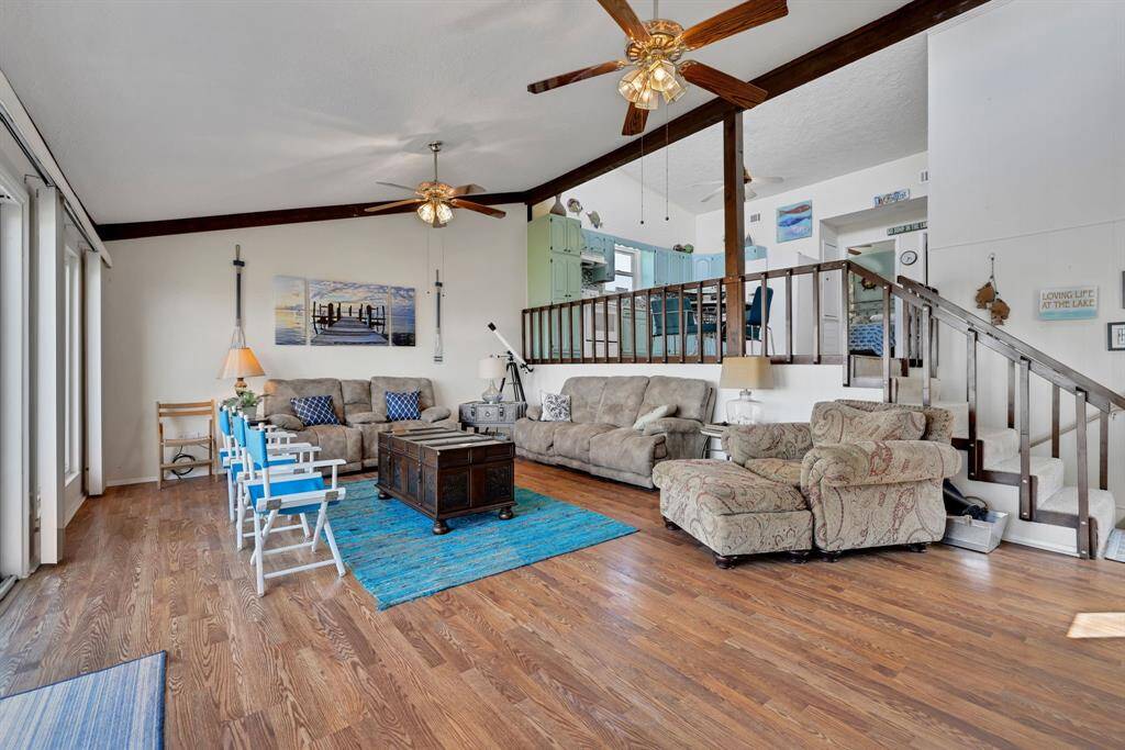 The flow between levels allows for easy conversation while entertaining guests and a view of the water!
