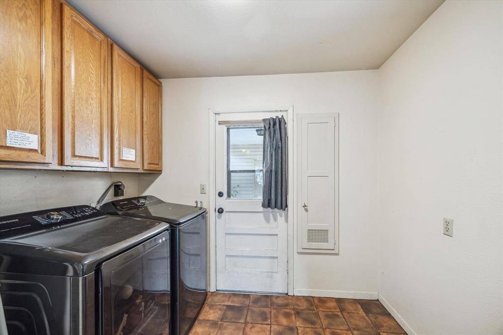 Inside utility room.  No hauling clothes to the garage to wash.