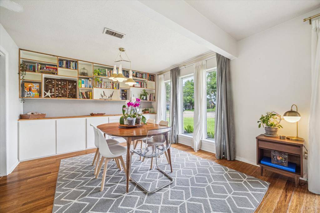 Large scale dining sets will fit with ease, and still leave the balance of the space for additional living area or home office.  More full length windows.