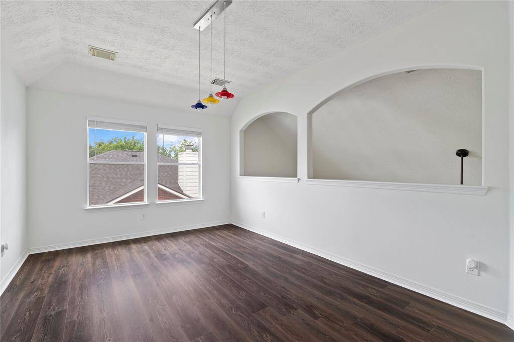 Upstairs you'll find a large flex space with brand NEW LVP flooring offering endless possibilities, use it as a game room, home office, or media lounge tailored to your lifestyle.
