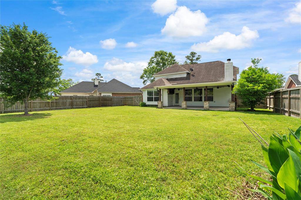 Set on a vast expansive lot, the home’s large backyard offers peace, privacy, and ample space for outdoor entertaining, play, or potential future projects.
