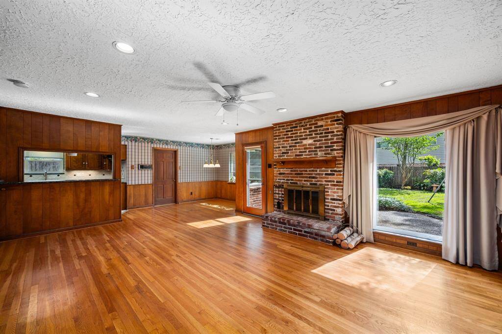 View of family room to breakfast room and kitchen. Family room opens to desk and back yard