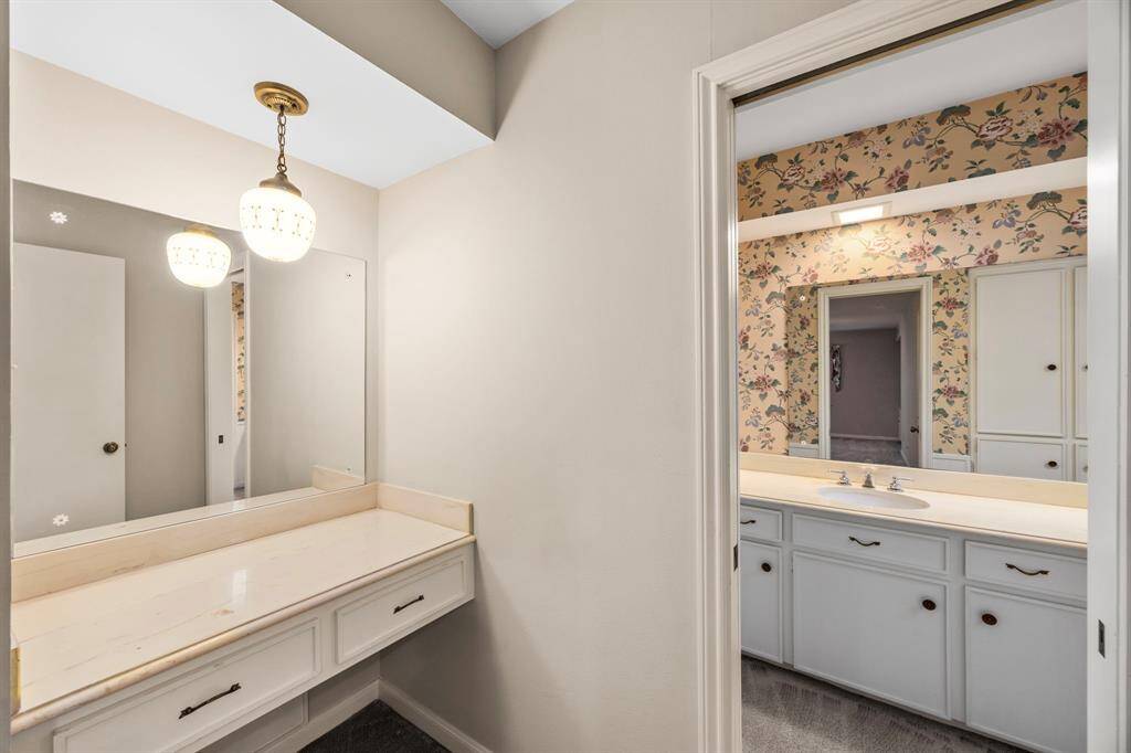 Primary bath has vanity